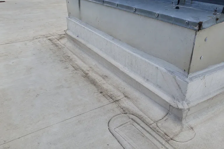 Modified bitumen and built-up roof detail on a low-slope commercial roof