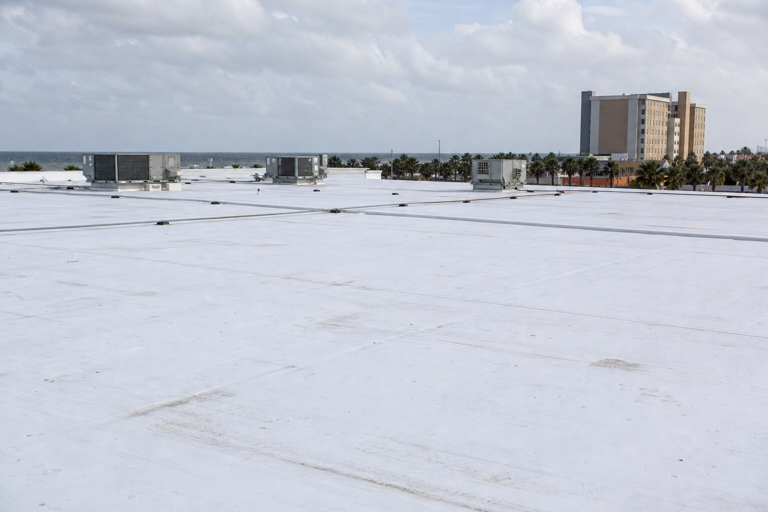 Illustrative commercial flat roof on a coastal Florida building