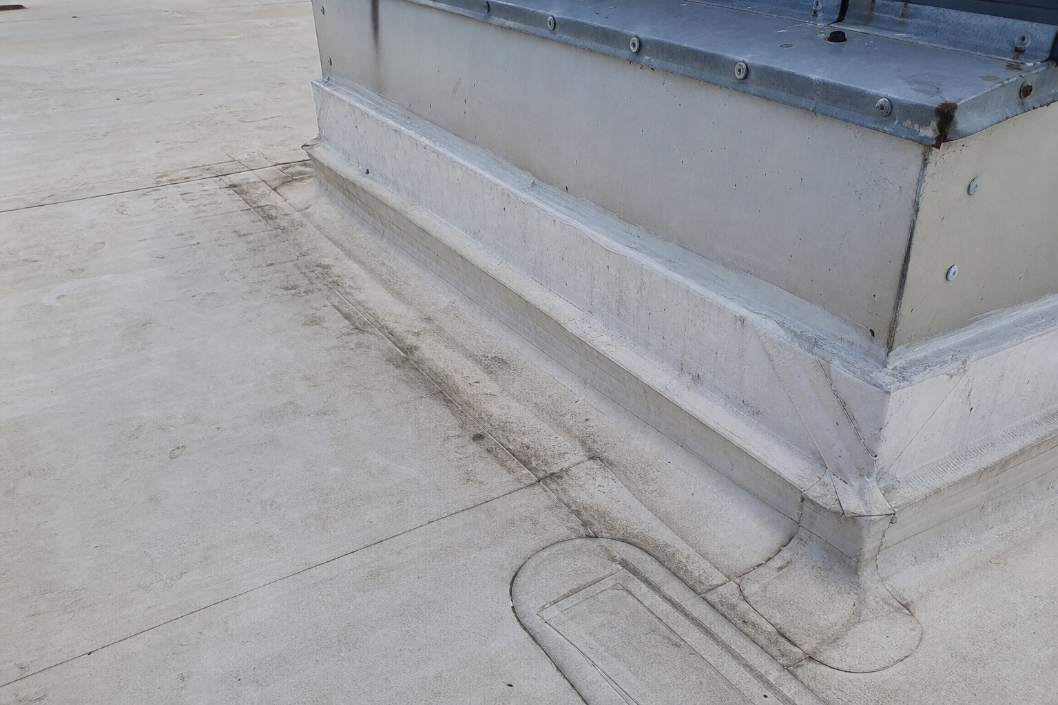 Illustrative commercial roof repair seam and curb detail